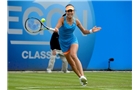 BIRMINGHAM, ENGLAND - JUNE 10:  Ana Ivanovic of Serbia in action during her first round match against Mona Barthel of Germany on day two of the Aegon Classic at Edgbaston Priory Club on June 10, 2014 in Birmingham, England.  (Photo by Tom Dulat/Getty Images)